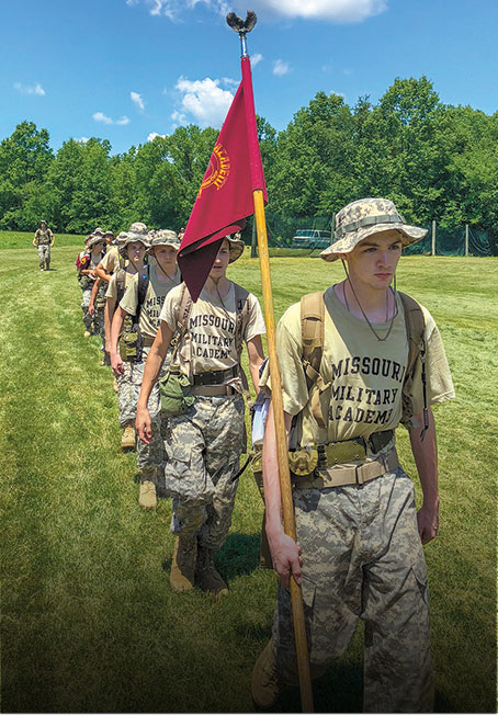 Boys marching in a line